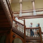 Picture of visitors descending the ornate staircase at Weelsby Hall on Heritage Open Day