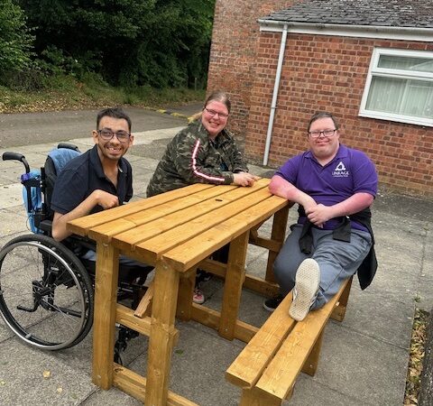 Linkage Choice Toynton enjoying their new wheelchair friendly bench.