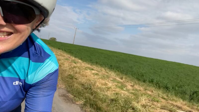 Zoe Haith cycling on her bike in the countryside as she trains for the C2C2C.